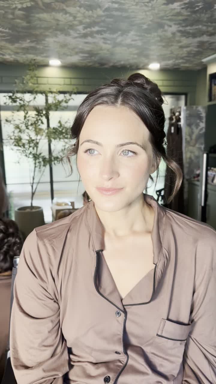 Samantha at work — applying makeup, mid-session