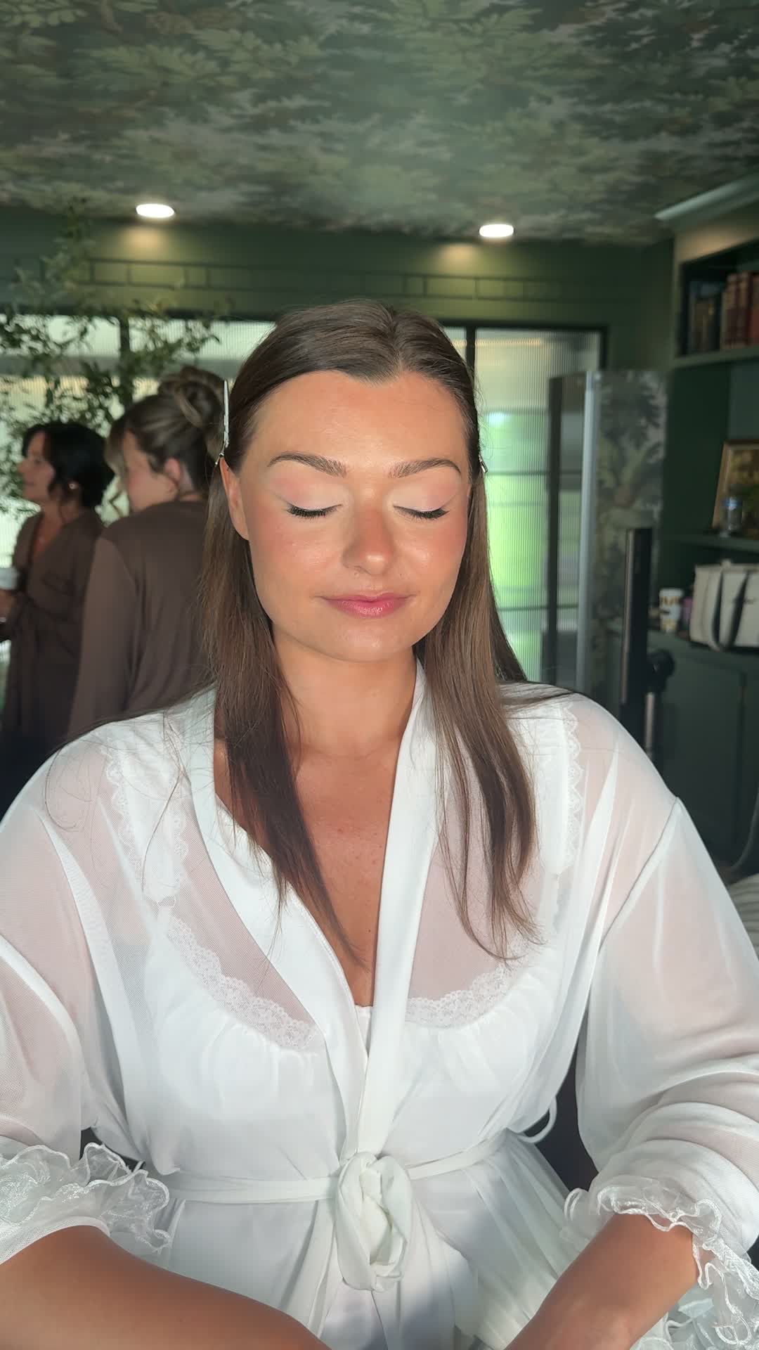 Samantha at work — refining a makeup look, mid-session